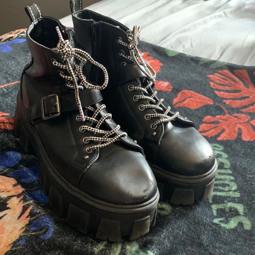 Black platform boots, black and white laces